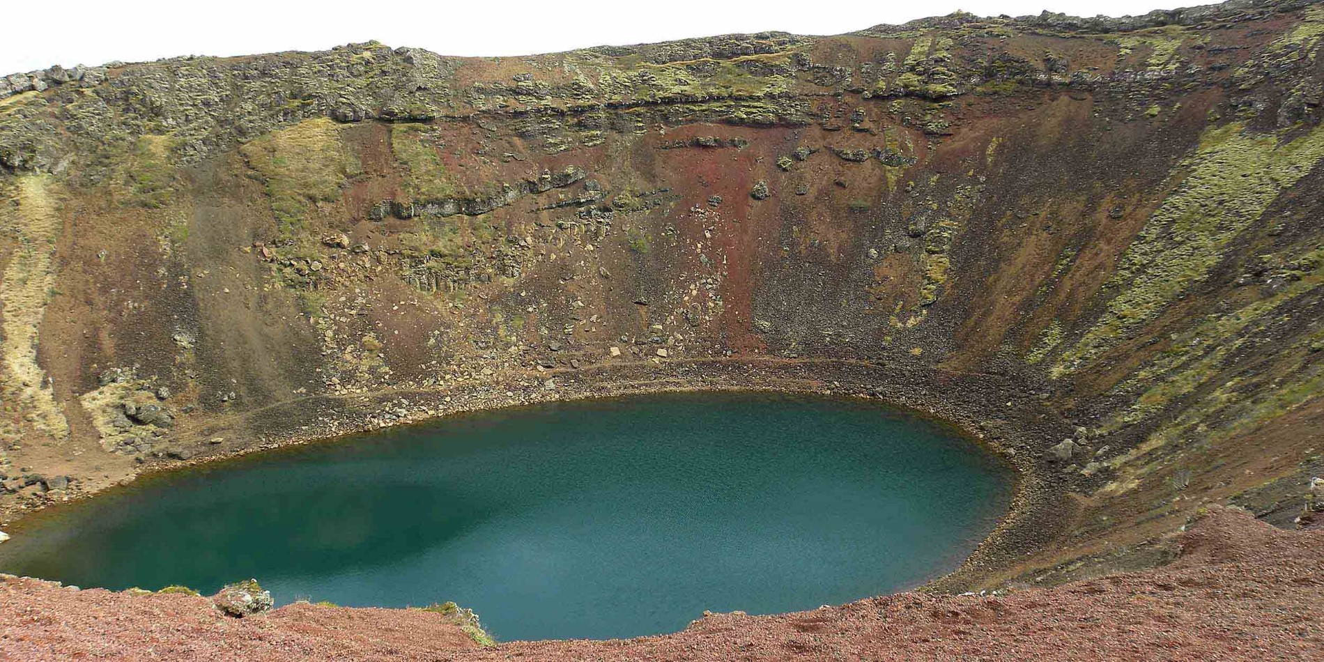 Water next to the rock with Big Hole in the background